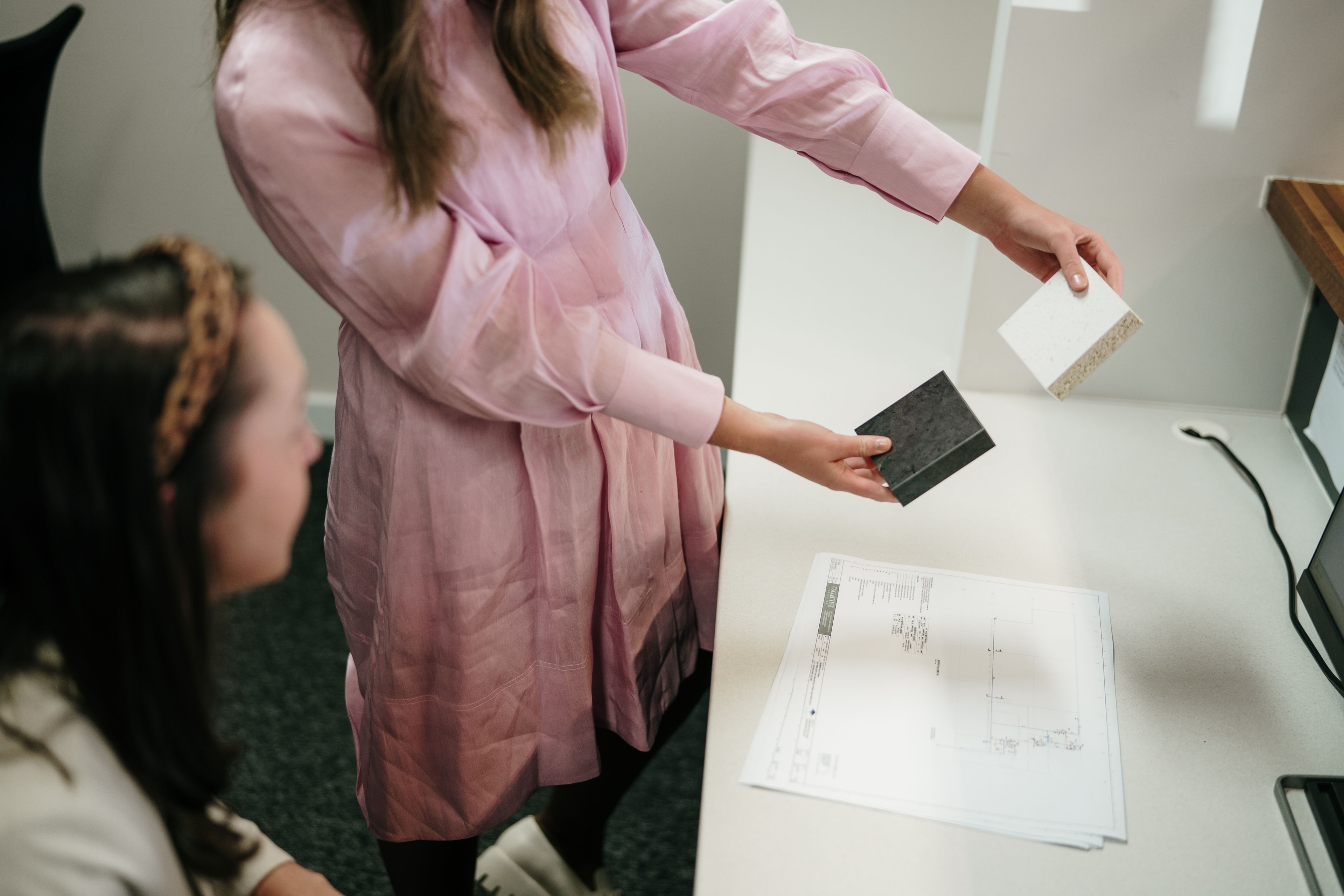 Designers comparing material samples